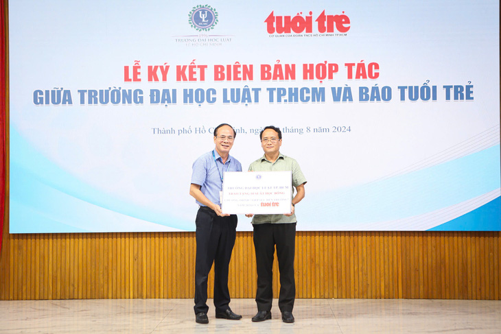 Trường đại học Luật TP.HCM và báo Tuổi Trẻ ký kết hợp tác - Ảnh 5.