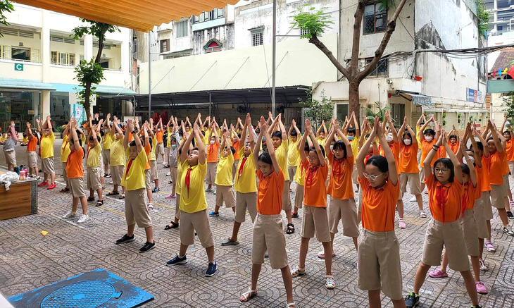 Giờ học thể dục của học sinh Trường tiểu học Nguyễn Thái Bình, quận 1, TP.HCM - Ảnh: NGỌC THỤY